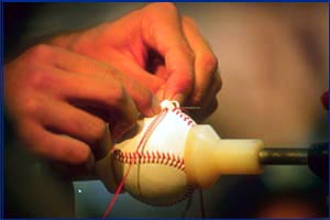 stitching a baseball