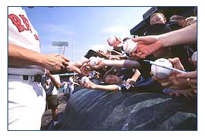 Player sign autographs for fans