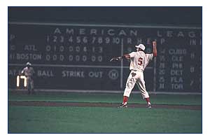 Nomar Garciaparra throws to third