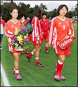 Chinese players arrive for practice