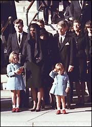 John F. Kennedy Jr. salutes at father's funeral